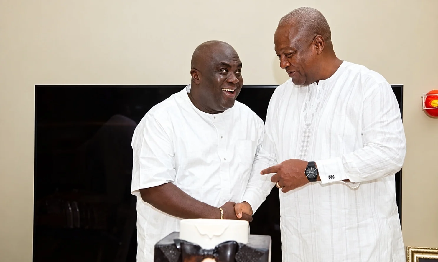 Julius Debrah and President John Dramani Mahama shaking hands