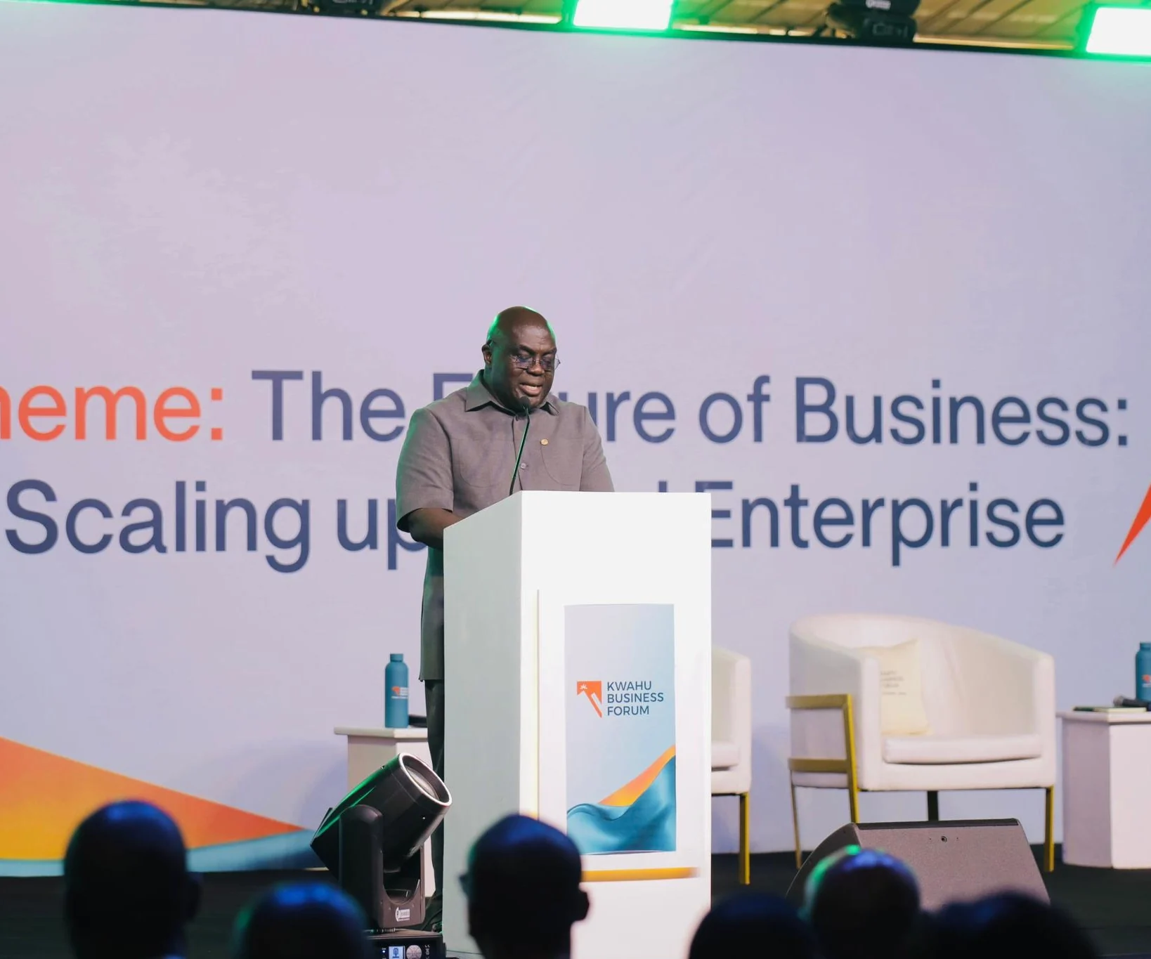 Julius Debrah speaking on stage at the Kwahu Business Forum
