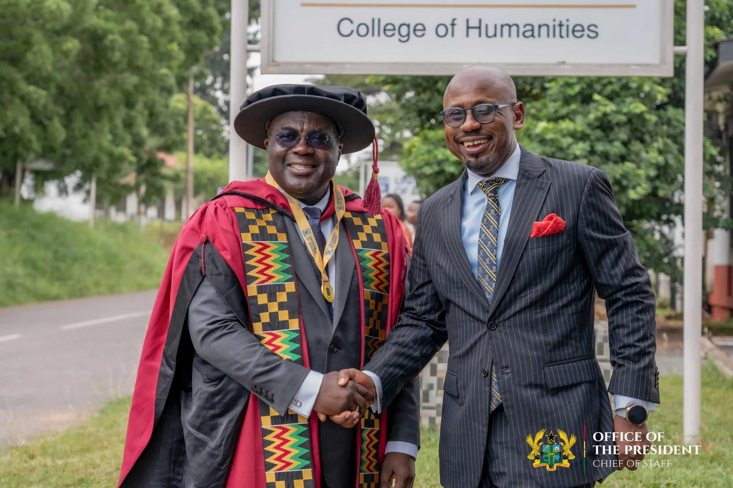 Julius Debrah in doctoral robes outside the College of Humanities, University of Ghana
