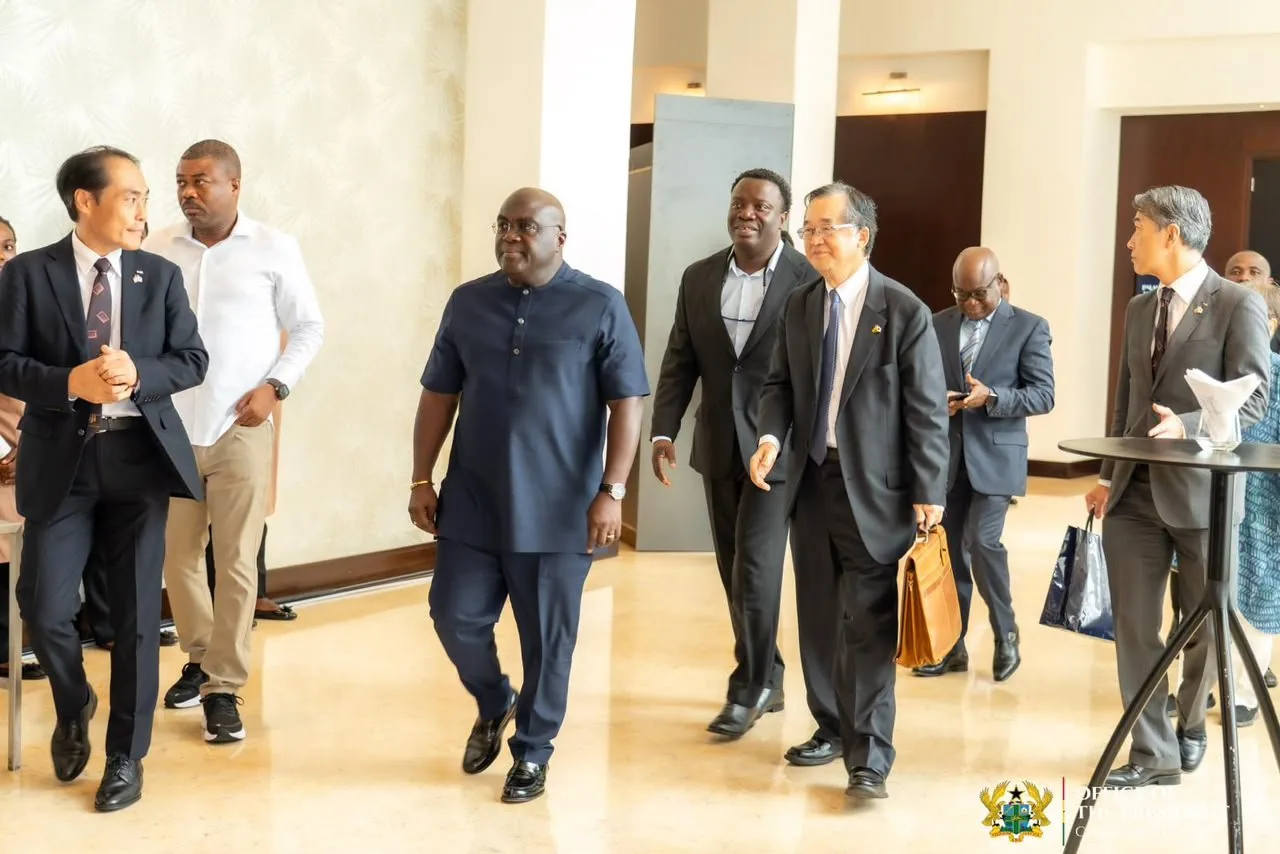 Arriving with members of the Japanese delegation