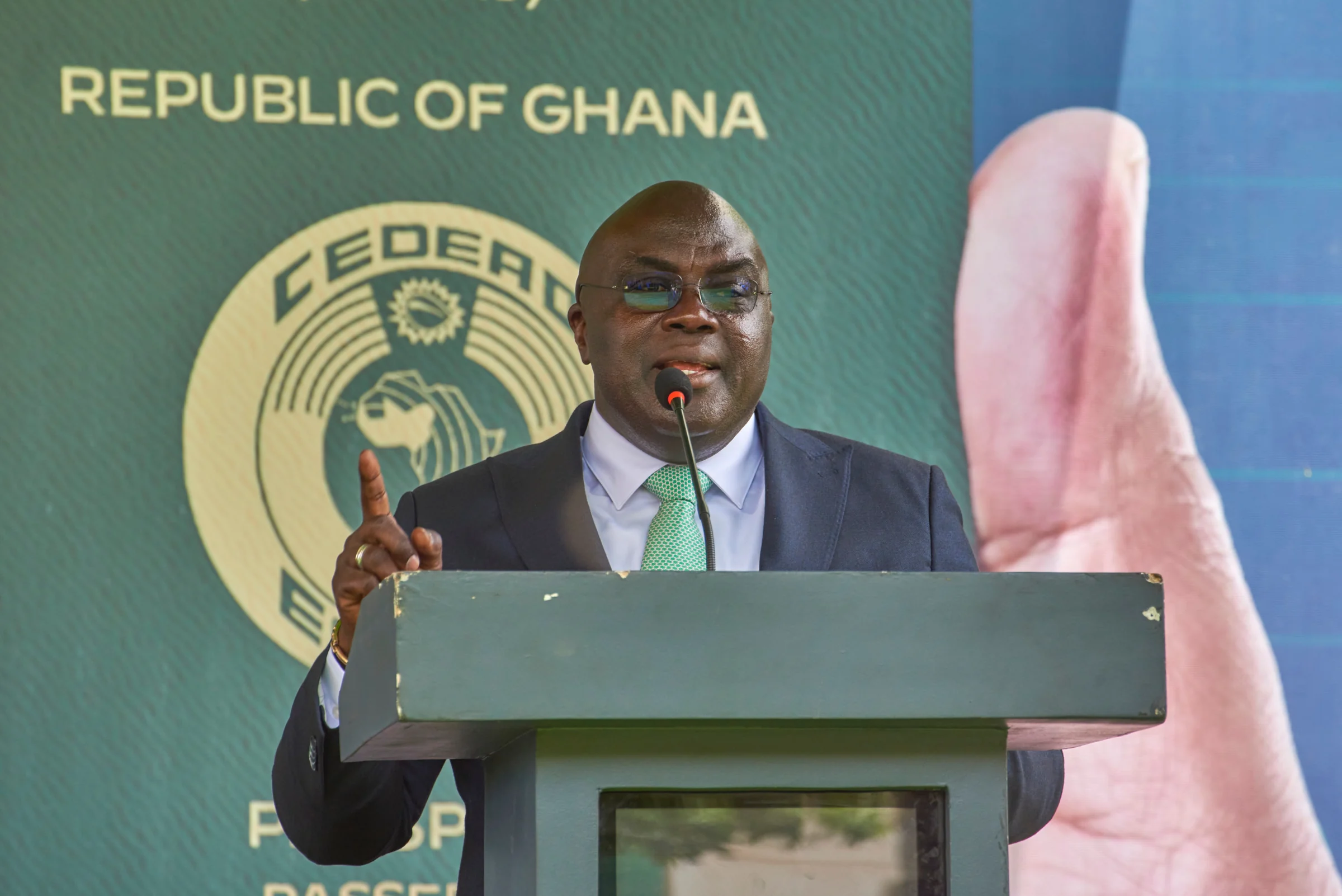 Dr. Julius Debrah speaking at a lectern